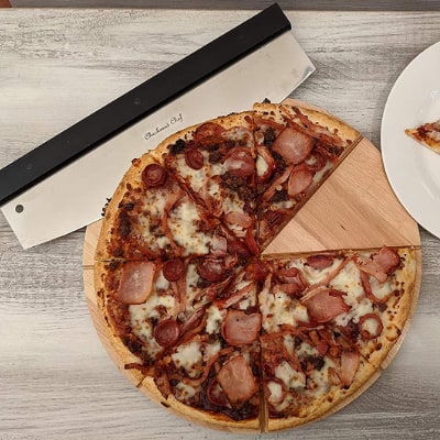 checkered chef pizza cutter and board
