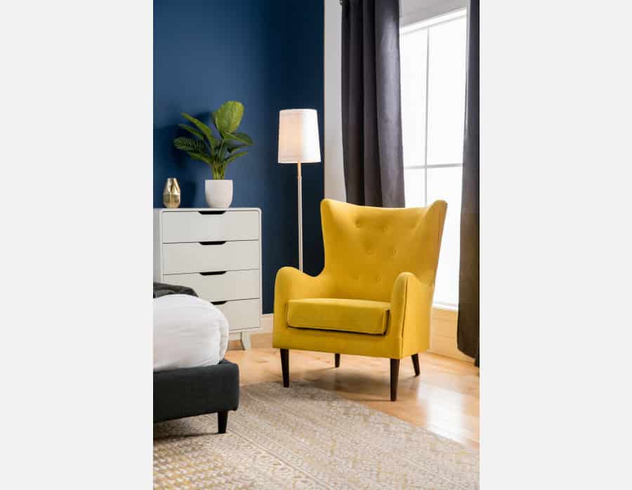 yellow wingback chair
