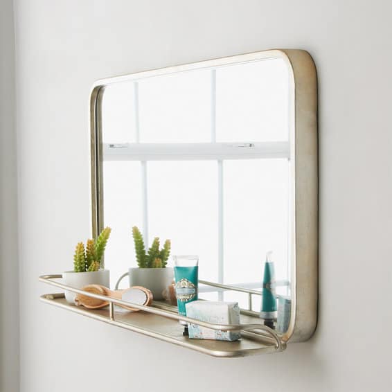 bathroom mirror with a shelf