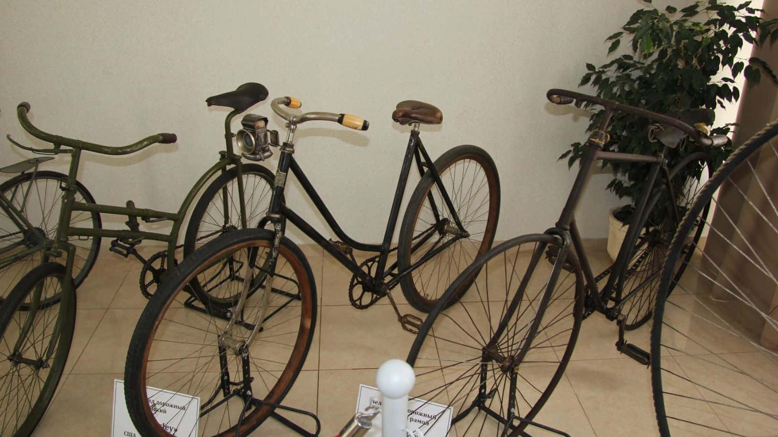 old bicycles standing upright