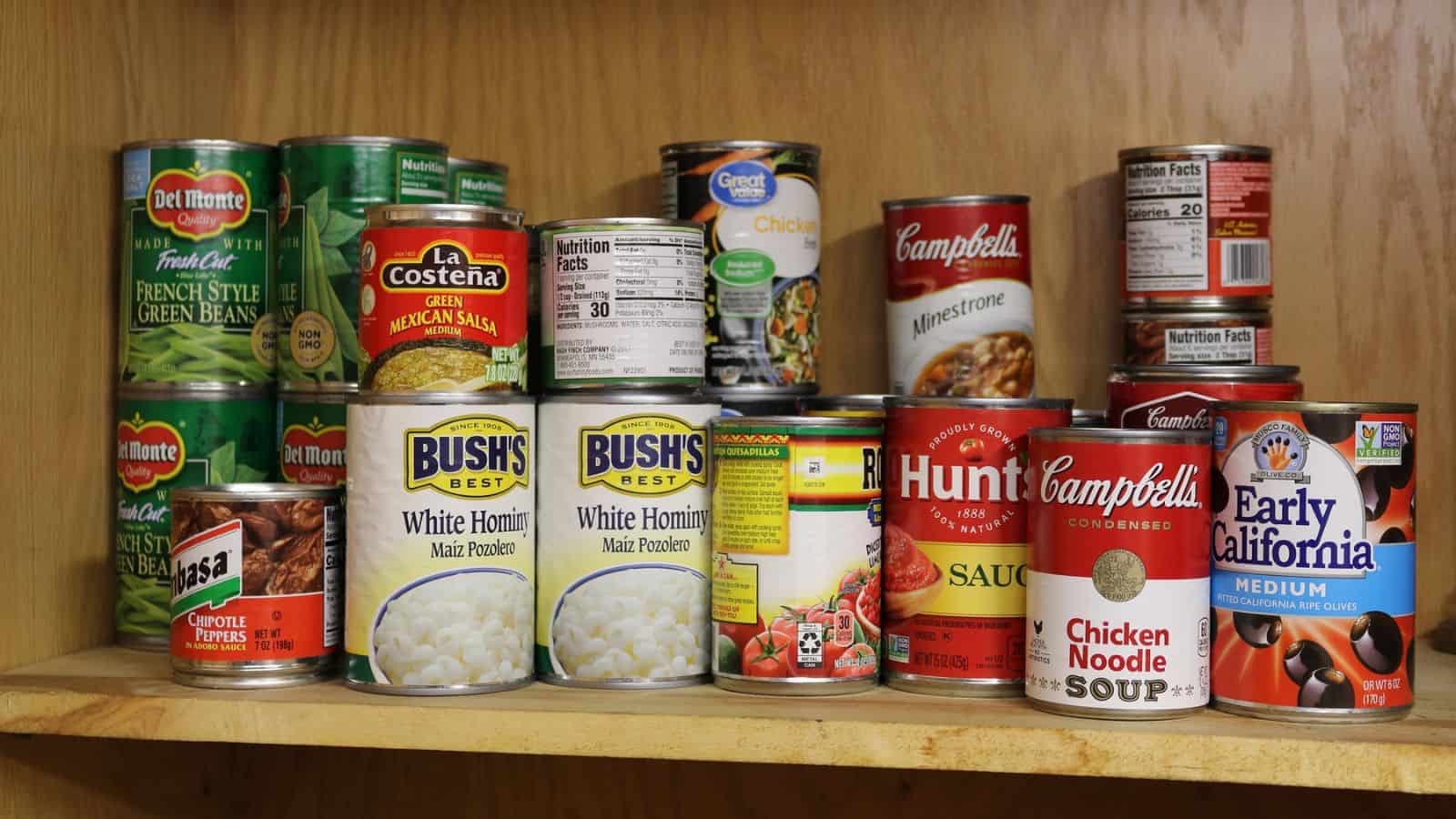 canned food in a wooden cabinet