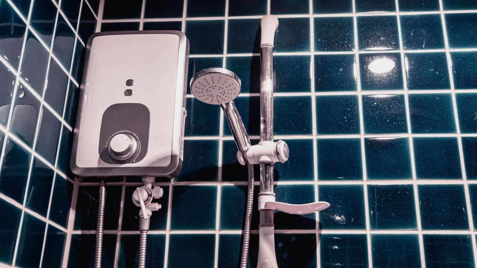 Shower with electric water heater mounted on a blue wall in a luxurious bathroom