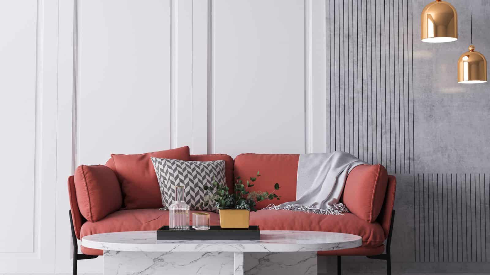 Bright colorful home interior, red sofa and marble coffee table