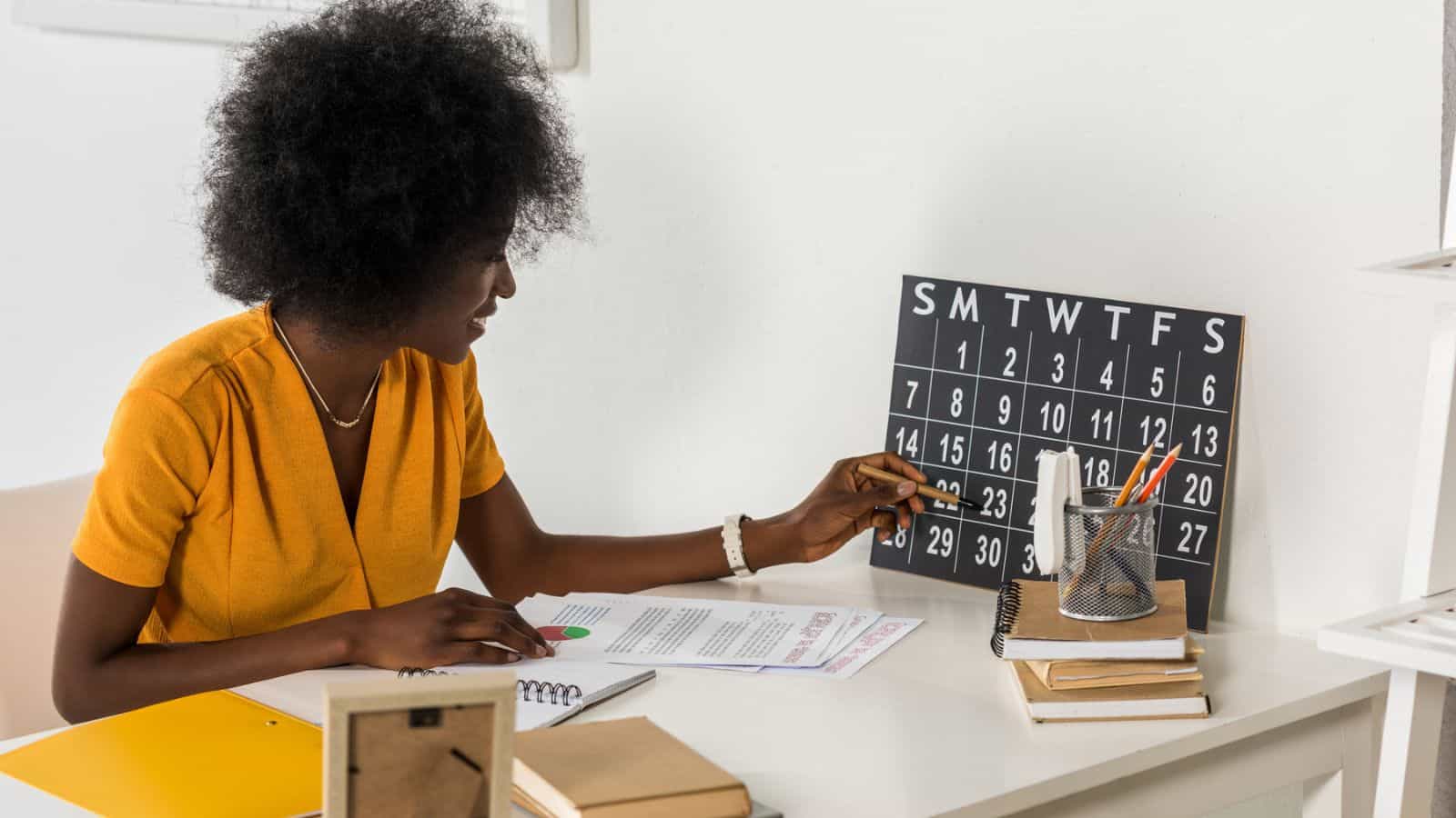 woman looking a calendar