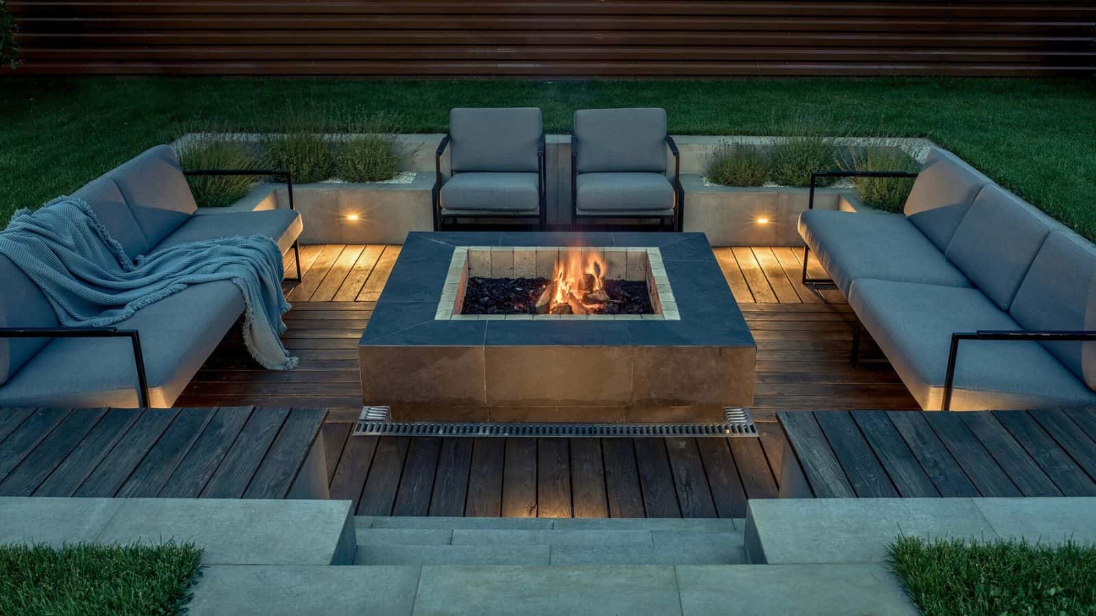 firepit in a landscaped backyard