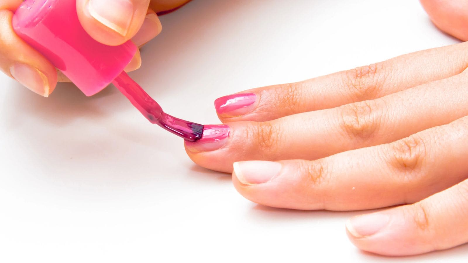 applying nail polish