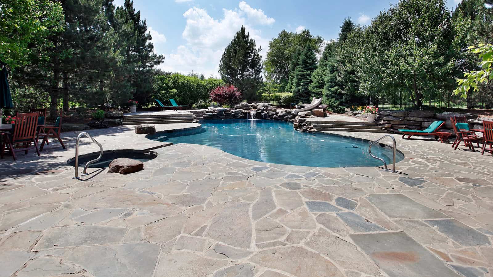 natural stone surrounding pool
